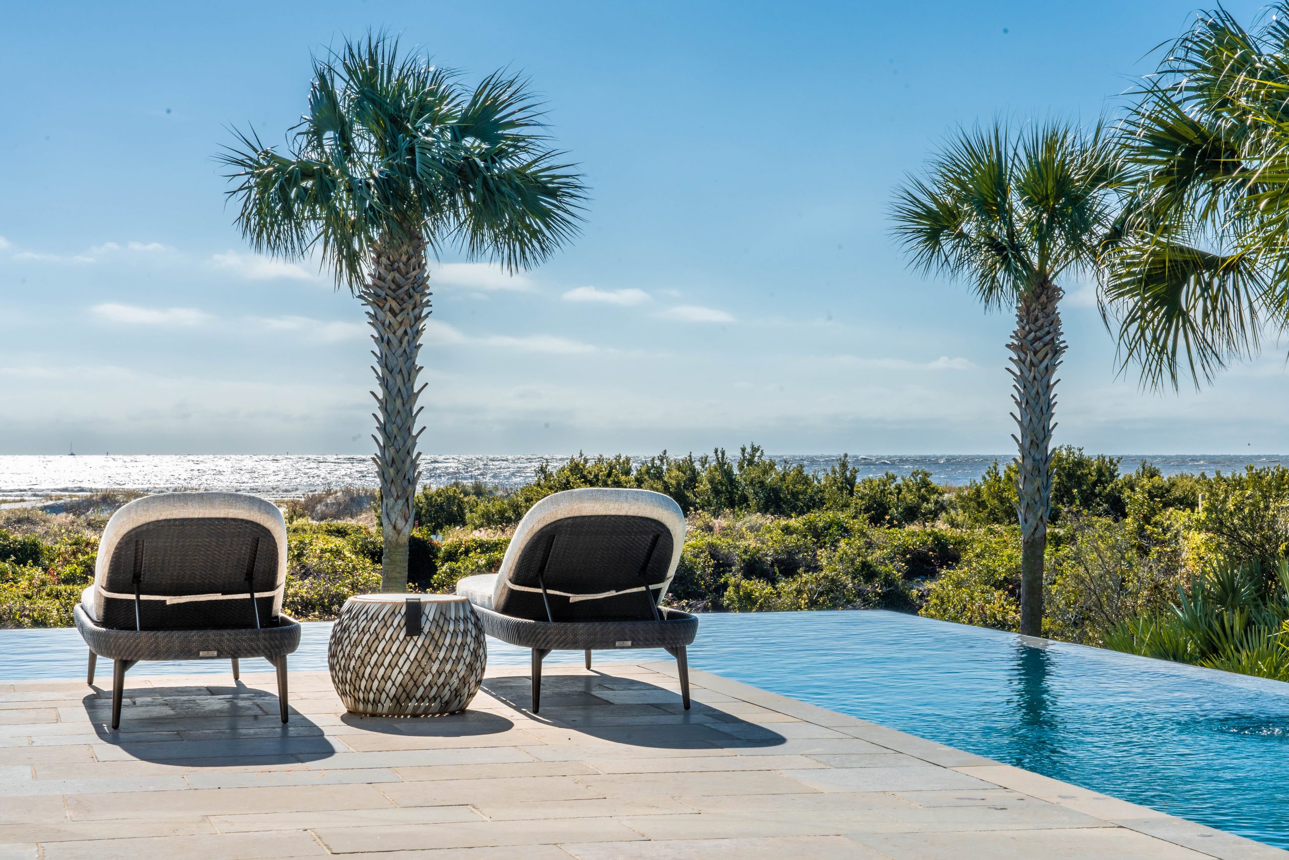 Real Lowcountry Pool House project — luxury infinity pool by Lowcountry Pool House